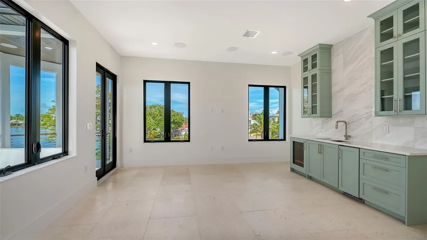 Designed with flexibility in mind, the home features a variety of beautifully appointed spaces that invite lively entertaining, peaceful relaxation, and everything in between.