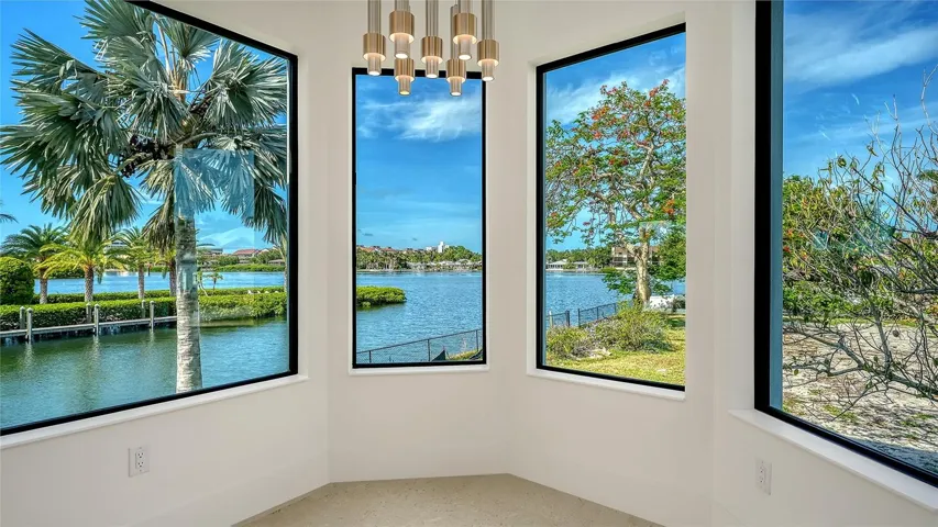 With panoramic waterfront views in every direction, the breakfast nook offers an extraordinary setting where morning coffee feels like a front-row seat to paradise.