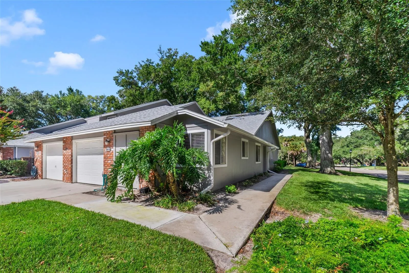 You'll love your one-car garage and shared driveway
