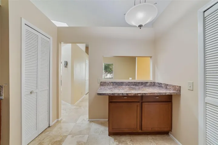 Bonus cabinet and counter space plus pass-through window
