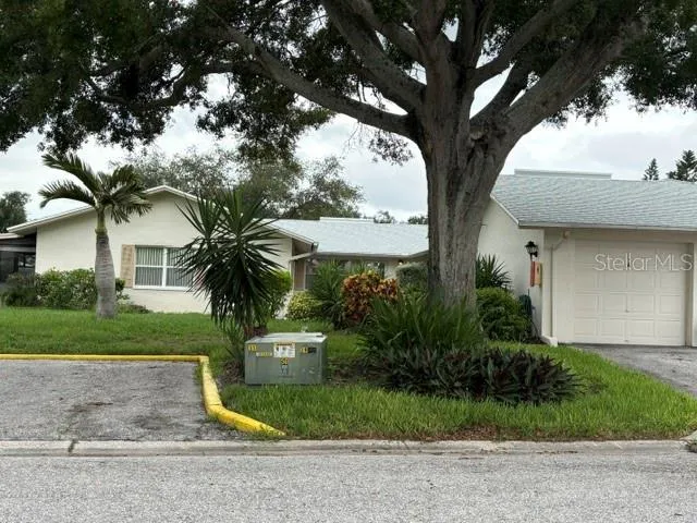 Front elevation with Garage and Guest parking