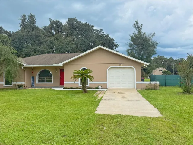 Front Exterior of Main house with view of Second home in background. Entirety fenced with gated front entry.