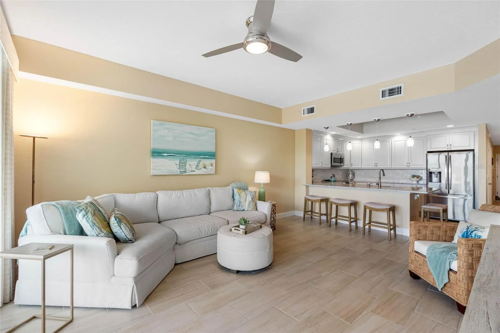 ...INTERIOR SHOT.. Photo without rug to Show Wood Plank Tile Thru -Out all Living Areas &amp; Bathrooms.. All 3 Bedrooms have New Luxury Vinyl Flooring. Condo Shows Great. Turn Key.
