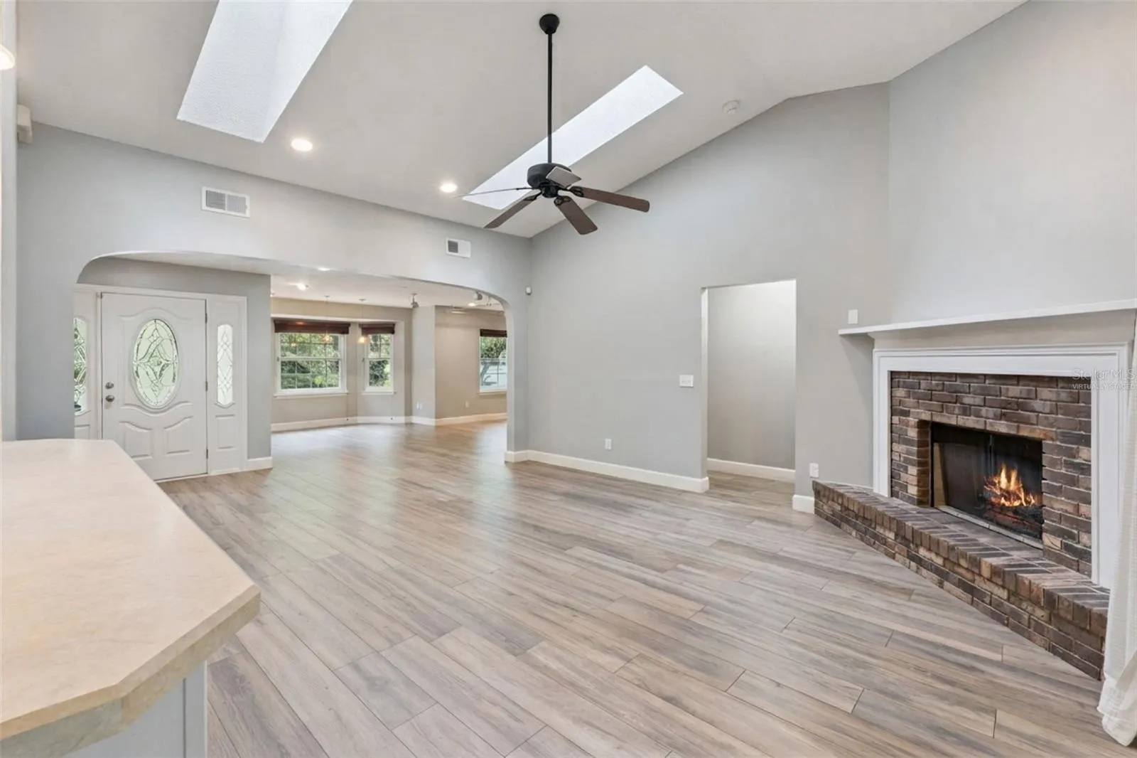 Cozy brick fireplace in the great room.