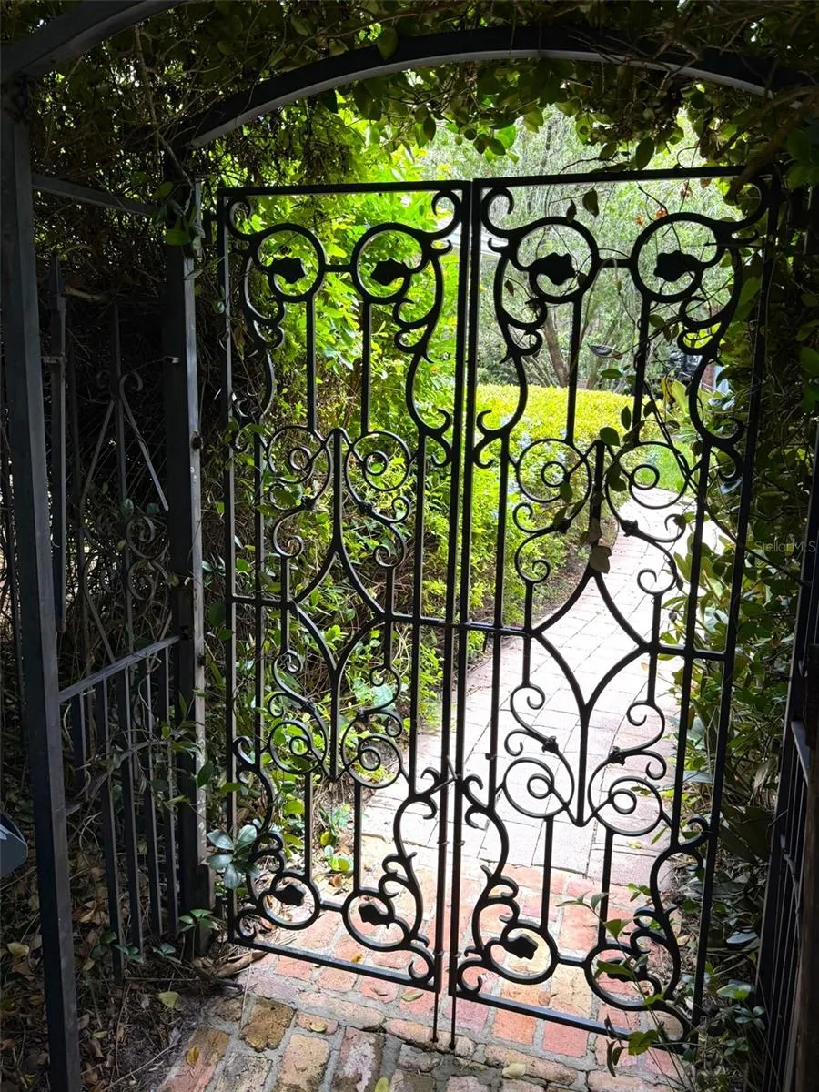 Beautiful wrought iron gate leading to the front yard.