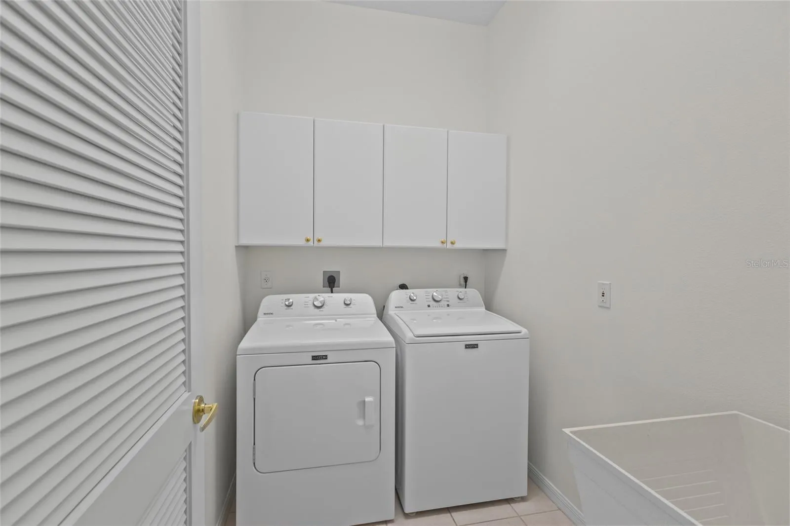 Laundry Room with Slop Sink
