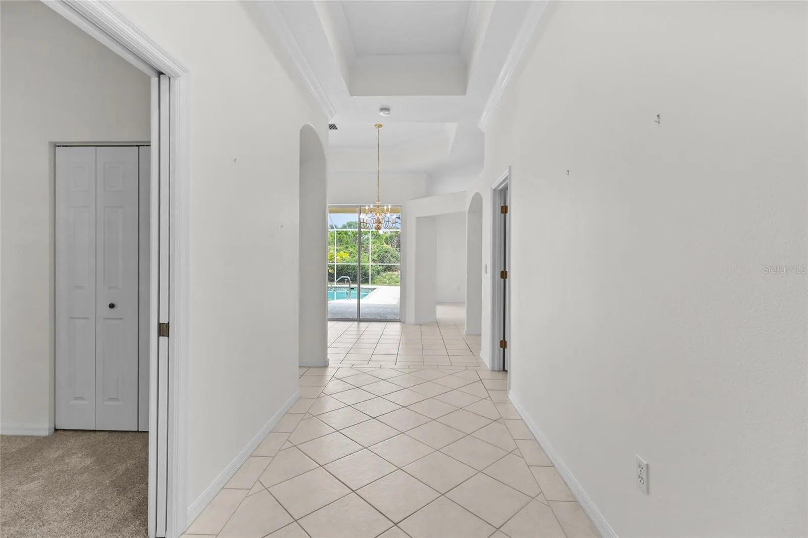 Front hallway with 3rd bedroom on left.