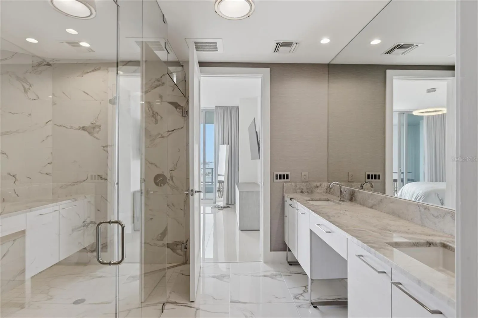Double vanities, stone counters