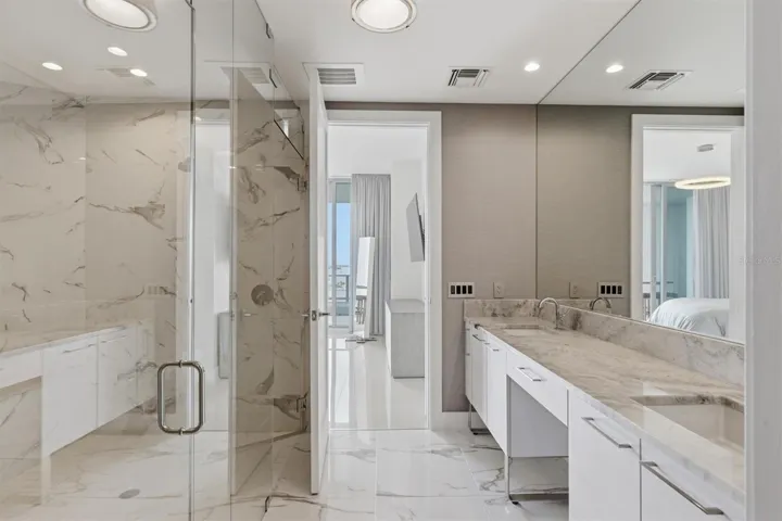 Double vanities, stone counters