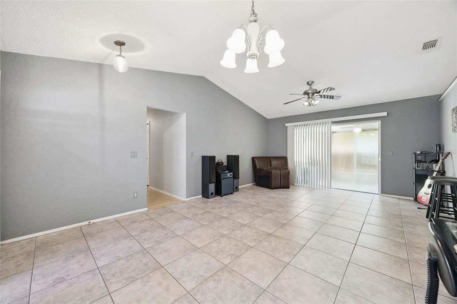 Dining Room - 10 X 9.9 - open flow to Living Room and Sliders to Lanai.