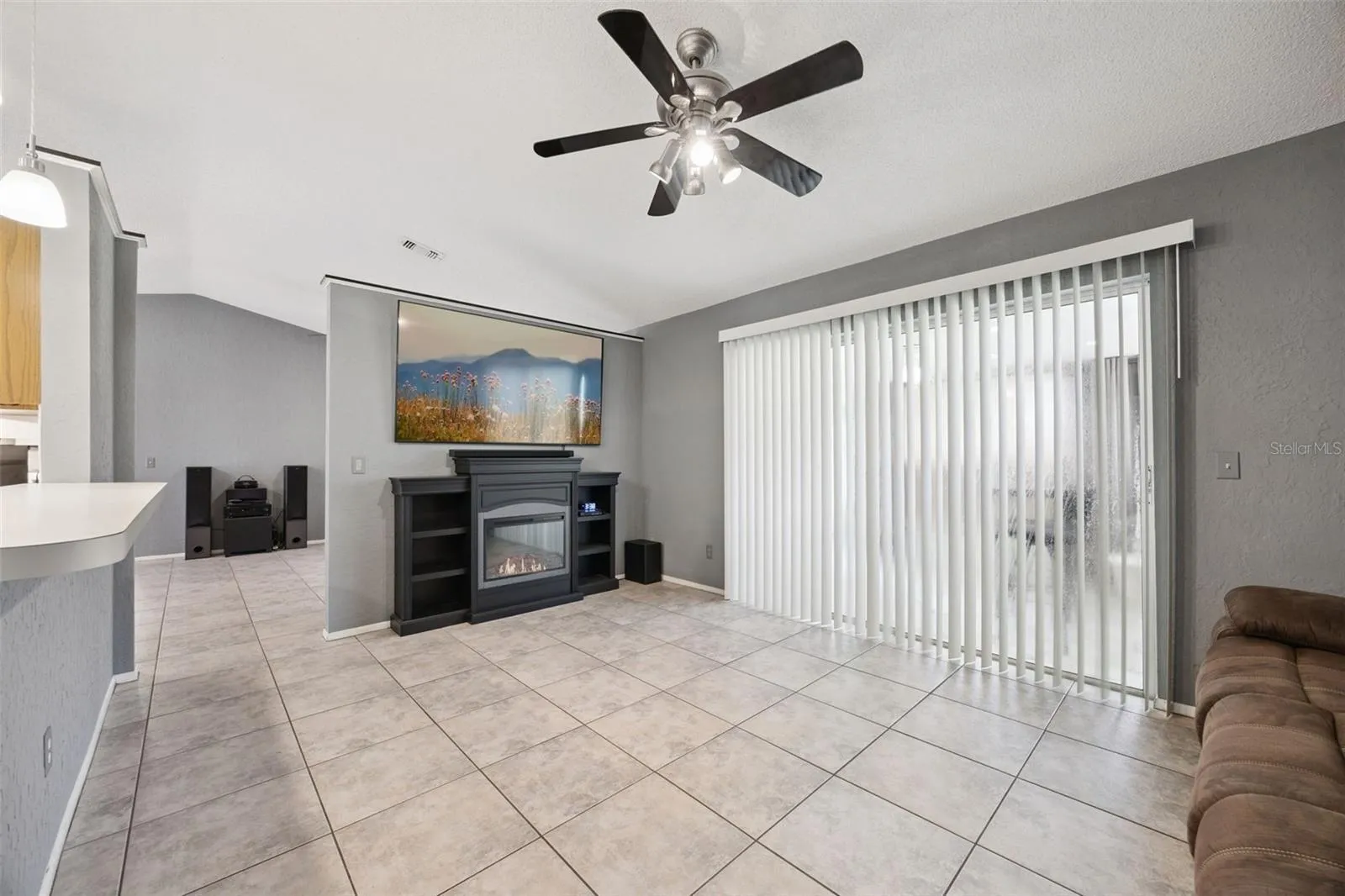 Family Room has sliders to Screened Lanai.