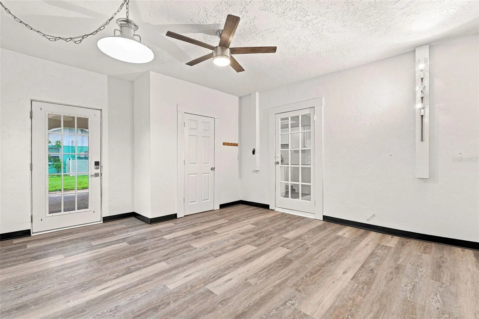 Family Room with Convenient Access to the Carport and Storage Room