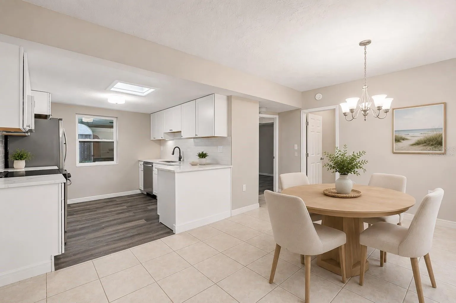 Virtually Staged Open Dining Area Flowing Seamlessly Into Updated Kitchen
