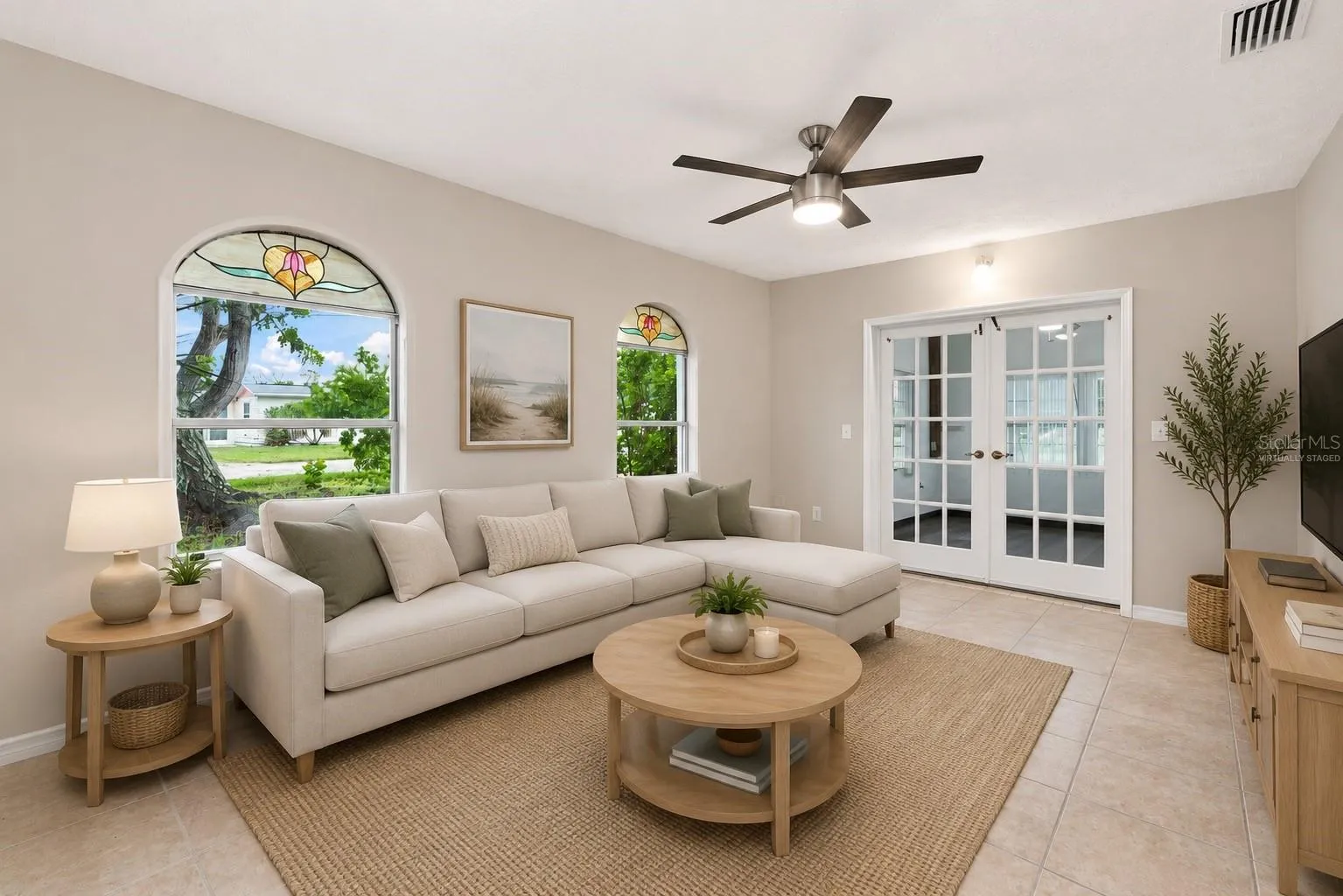 Virtually Staged Living Room with Charming Stained Glass Windows