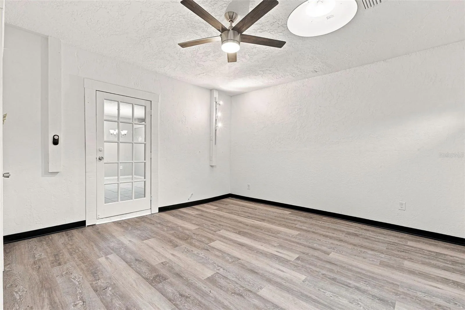 Updated Flooring in Family Room with Vaulted Ceiling