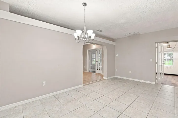Open Dining Area Flowing Seamlessly Into Updated Kitchen