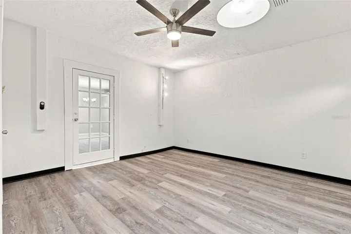 Updated Flooring in Family Room with Vaulted Ceiling