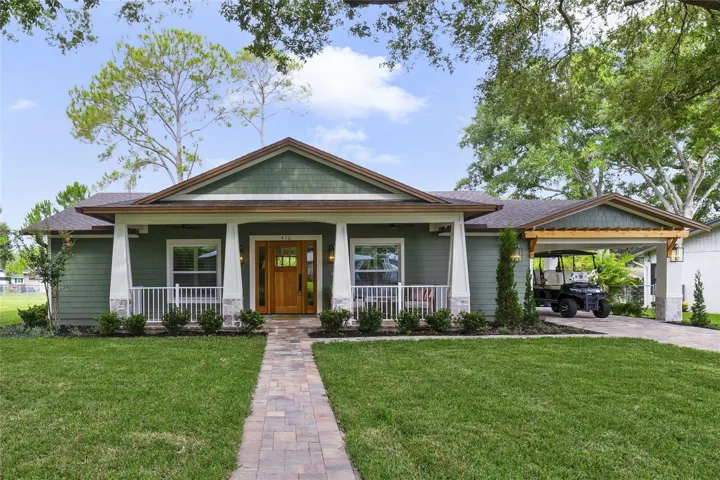 Welcome home to this craftsman inspired custom home in the heart of downtown Winter Garden!