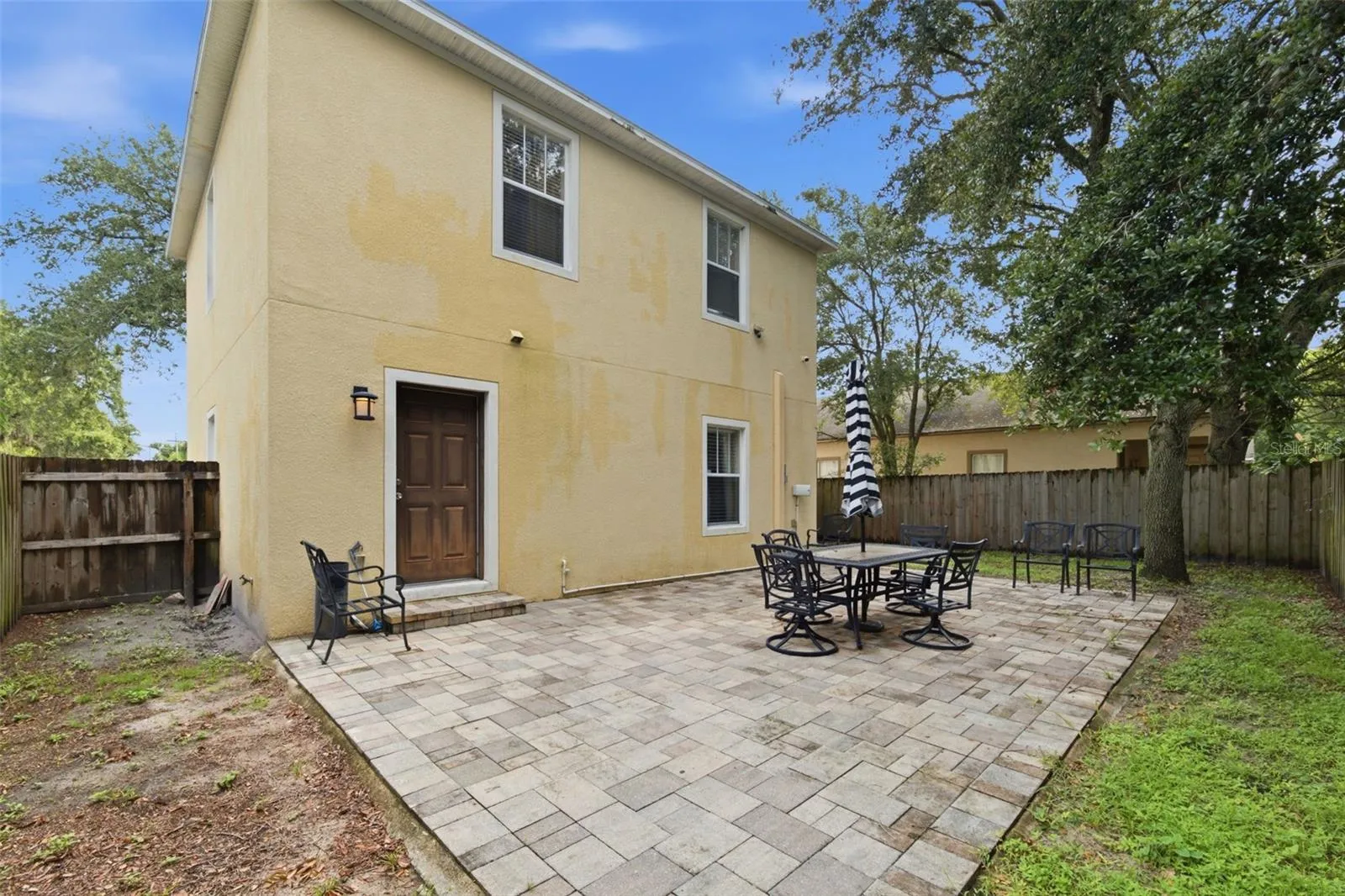 Fully Fenced Backyard with Seating, Water Softener and Privacy