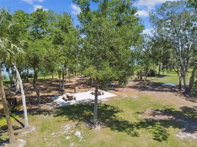 Picnic table with grill.  Also enjoy the fenced pet parks, ball and soccer fields, basketball courts, tennis/pickleball courts