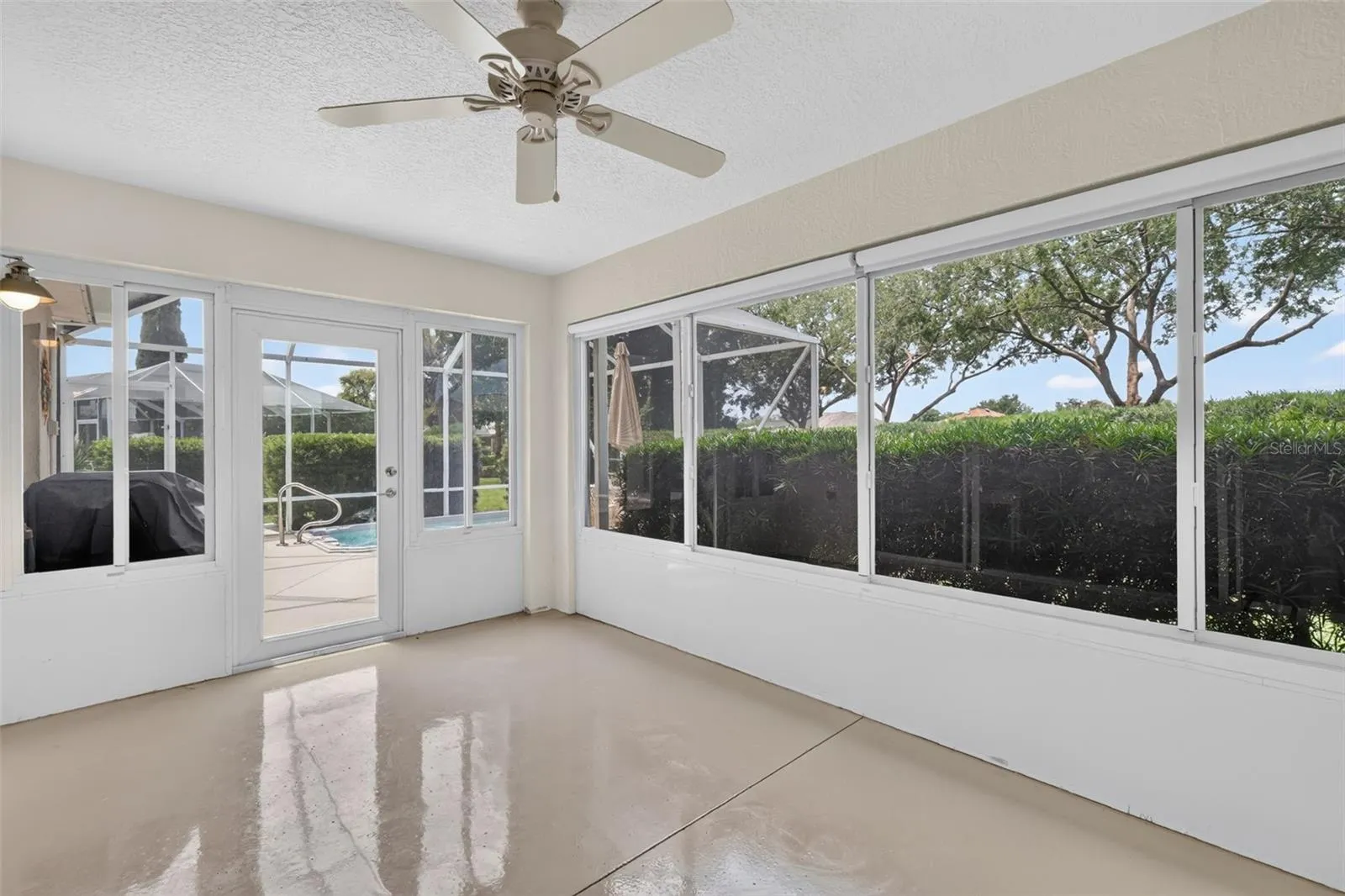 Spacious enclosed lanai under heat and air