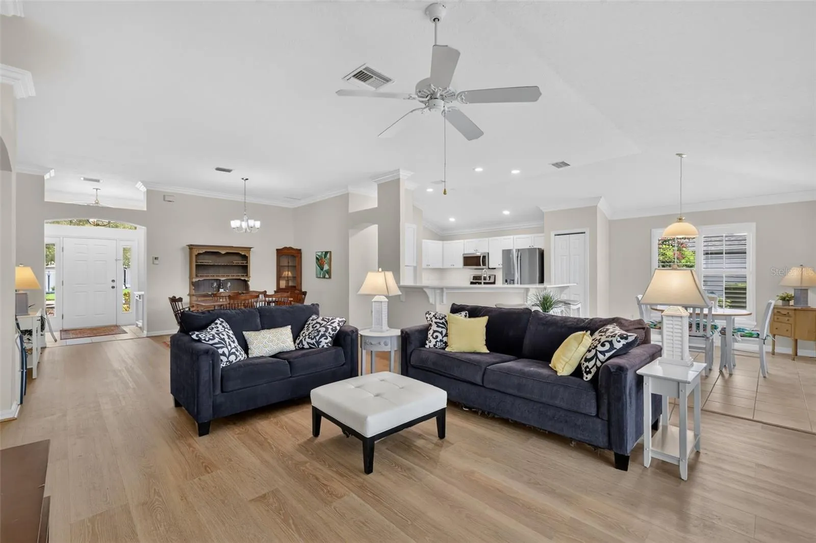 Open to the dining room and kitchen