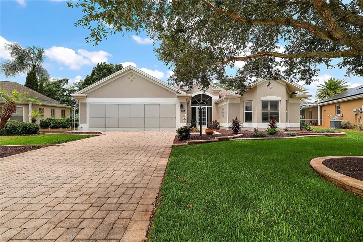 BOND PAID! Welcome to this BEAUTIFULLY UPDATED 3-bedroom, 2-bath LANTANA Designer featuring a SWIM SPA in the desirable Village of Santo Domingo