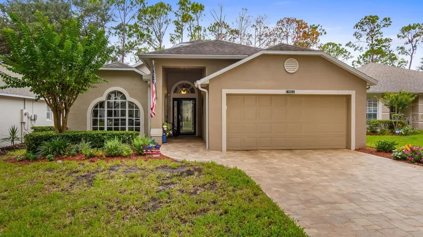 Front With Paver Driveway and Walkway