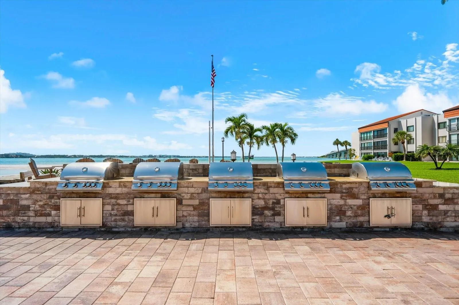 The outdoor grill area is large and inviting.