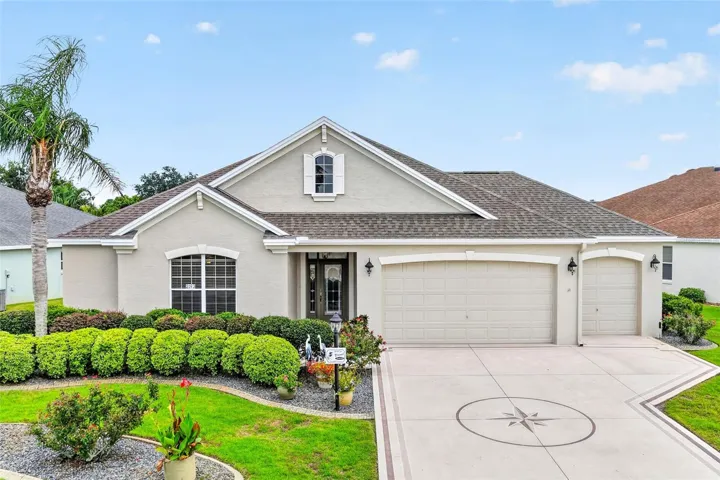 LOVELY 3-bedroom, 2.5-bath BRIDGEPORT Designer with a 2-car plus GOLF CART GARAGE and GOLF CART, ideally located in the sought-after Village of Duval.