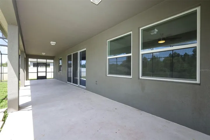 Spacious open lanai, perfect for a family seating area.