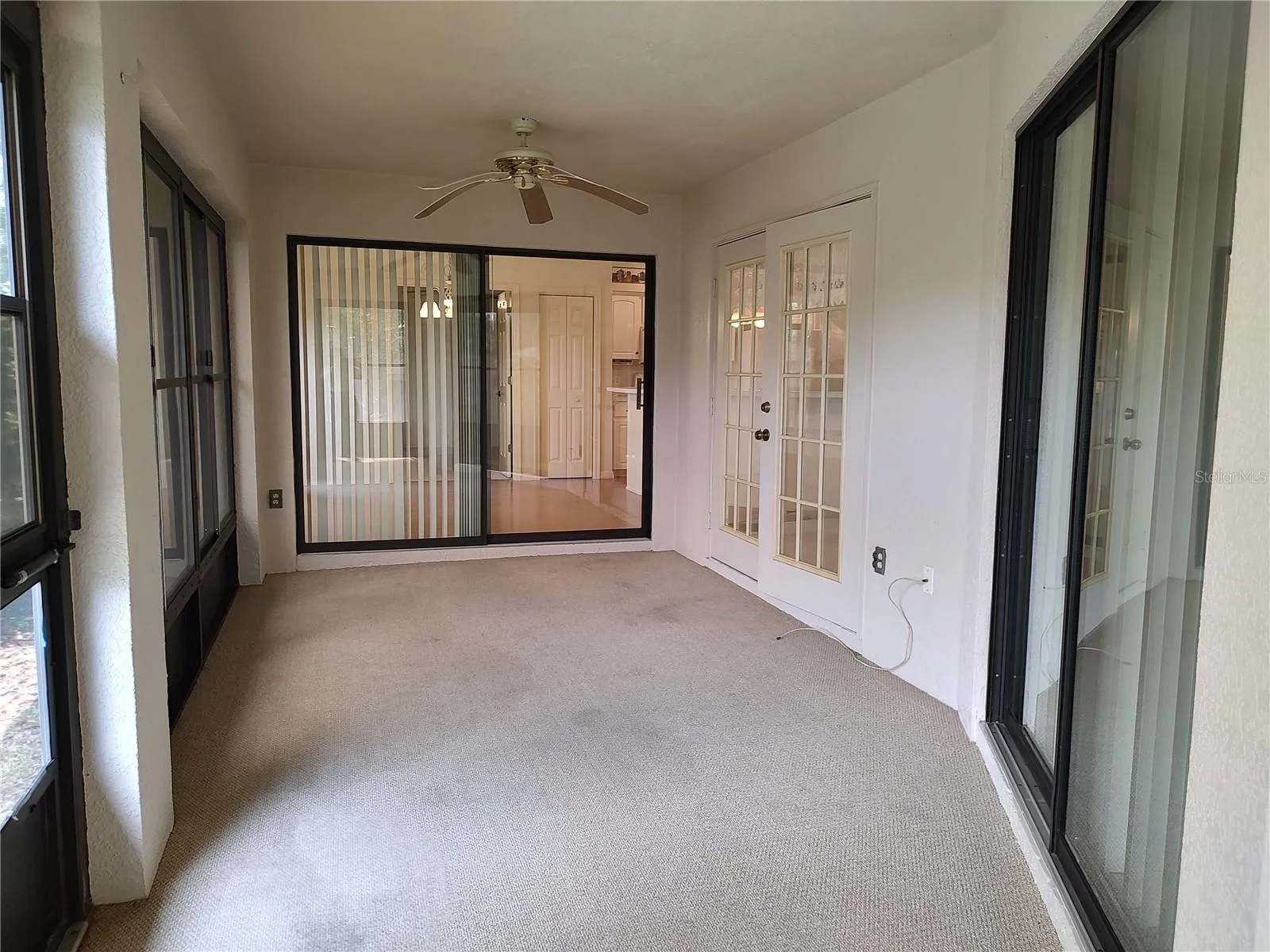 Back porch, screened vinyl windows