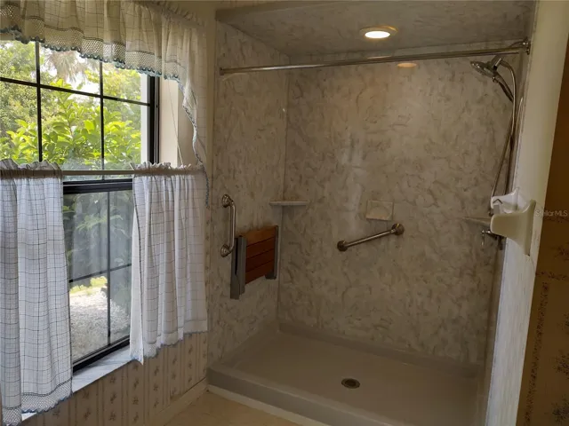Primary Br. shower w/seat & grab bar