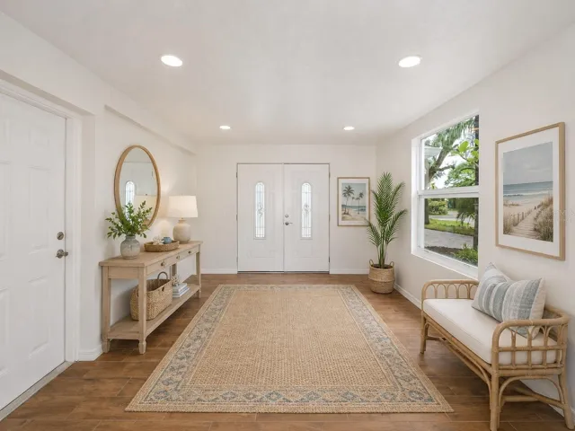 Virtually Staged down stairs foyer