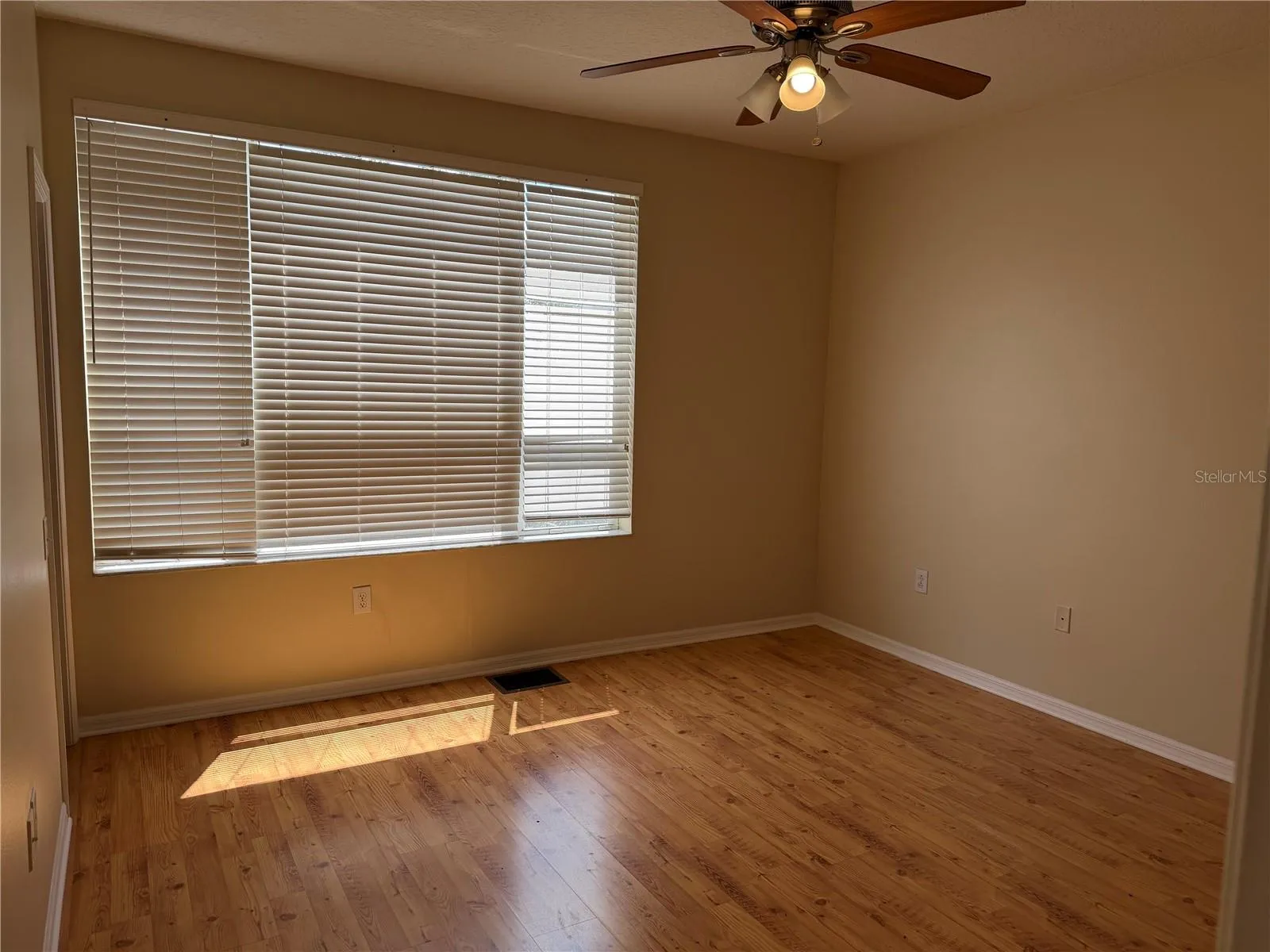 Primary Bedroom with wall to wall closet and  private Bathroom.
