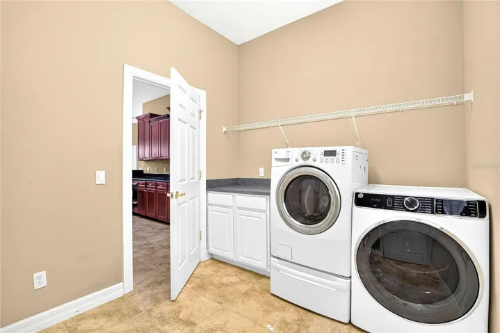 LAUNDRY, SHELVING AND FOLDING AREA