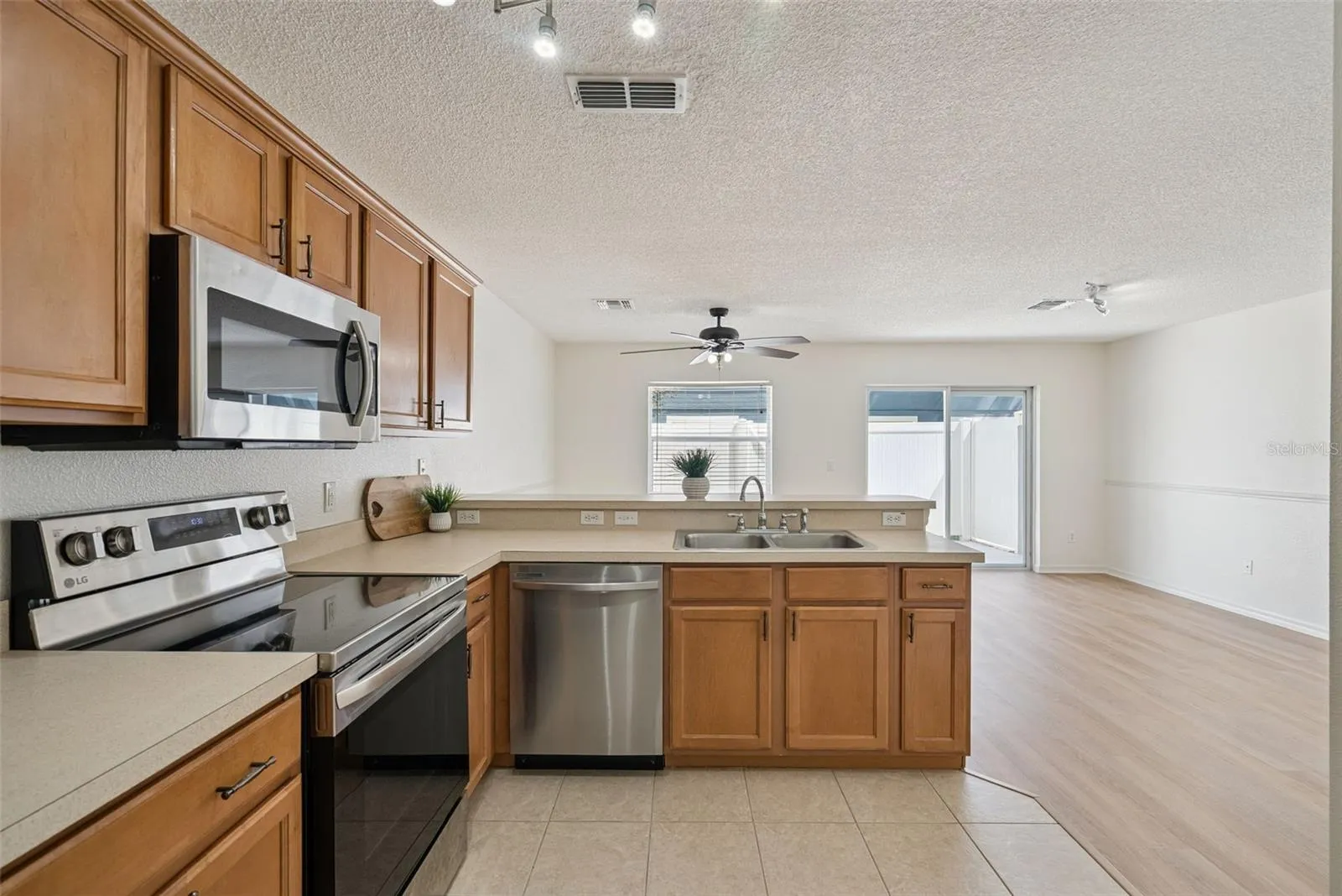 Bright Kitchen open to living areas
