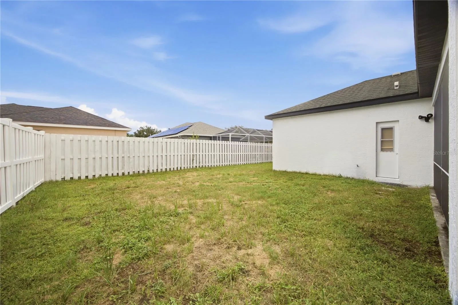 FENCED IN BACKYARD