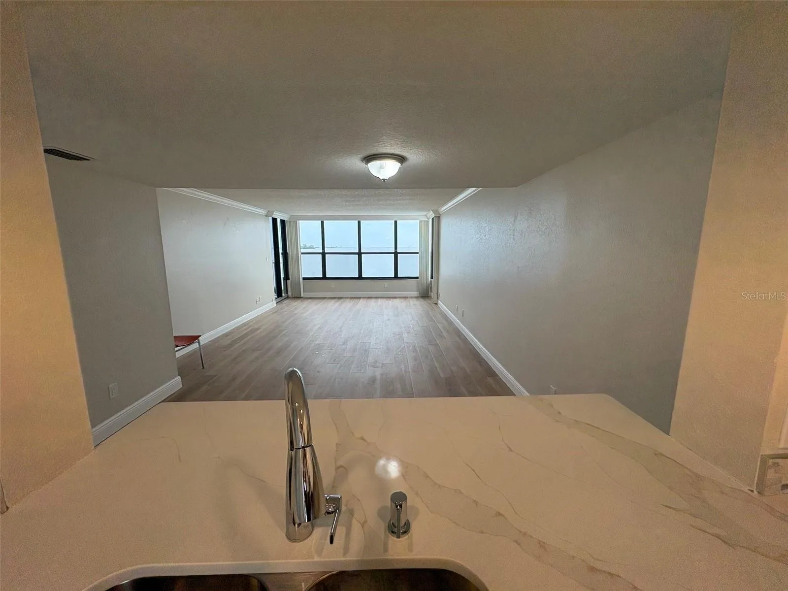 View from Kitchen Sink into Living/Dinning Room