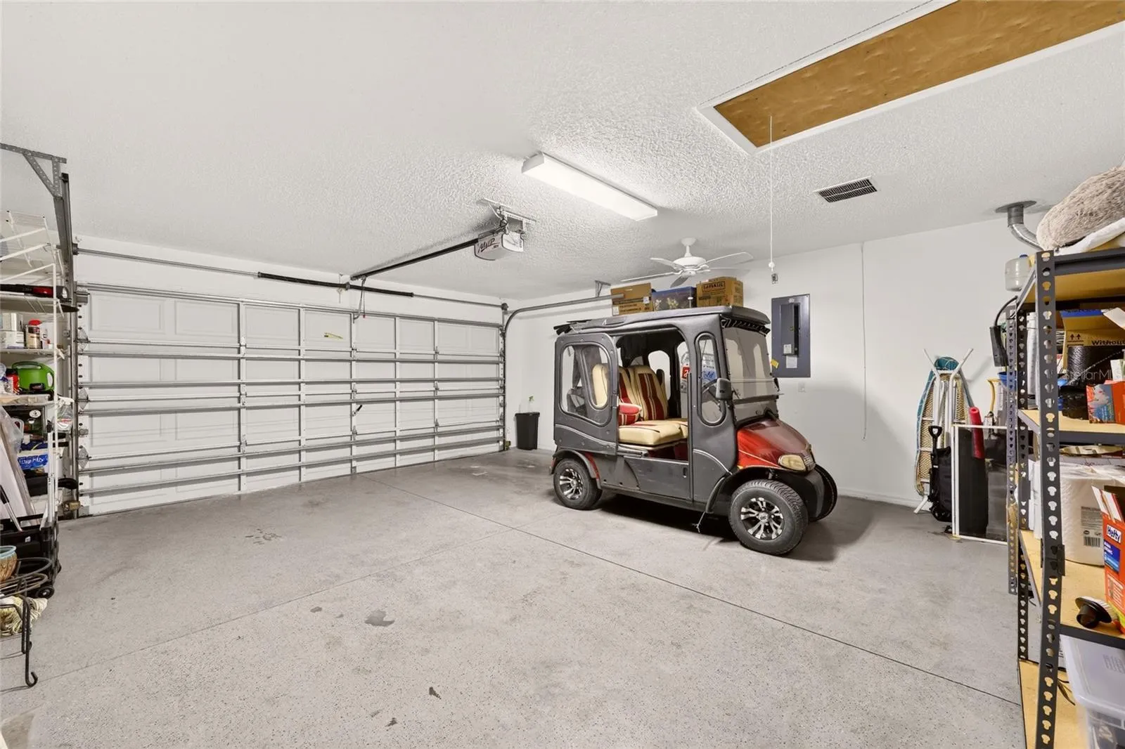 2-Car Garage (Golf Cart does not CONVEY)