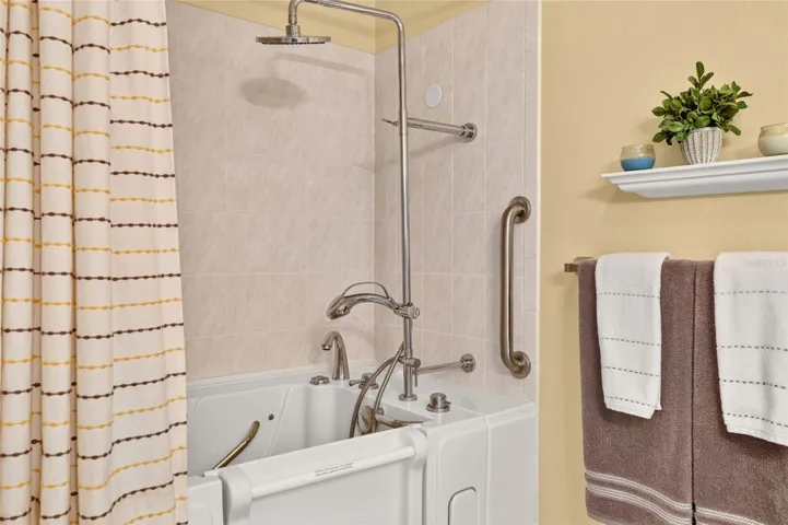 Nice Rainshower Shower Head and Grab Bars