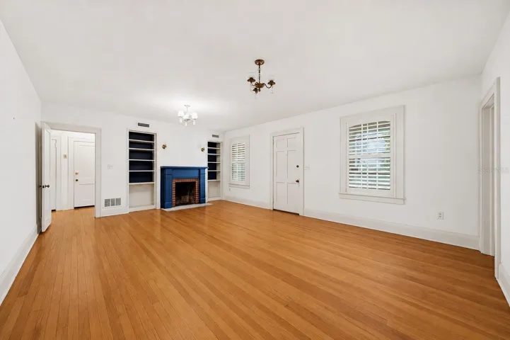 Parlor Room leading to hallway with 4 bedrooms