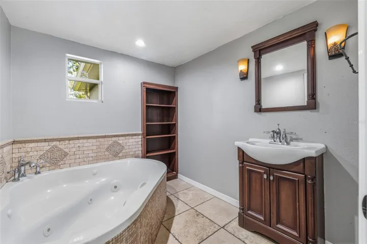 Bathroom 1 - w/Tub, vanity and toilet