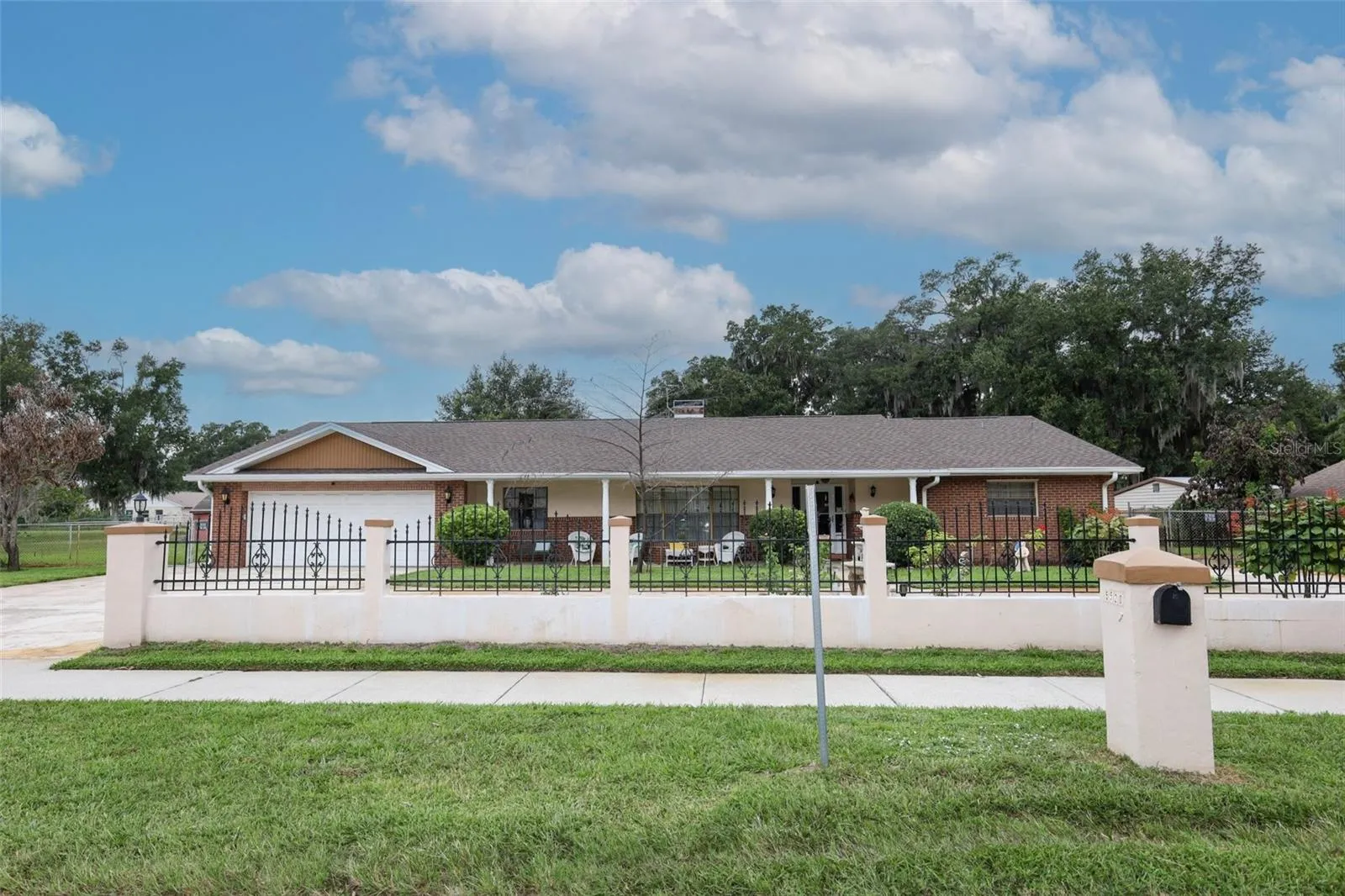 Front with circular driveway.