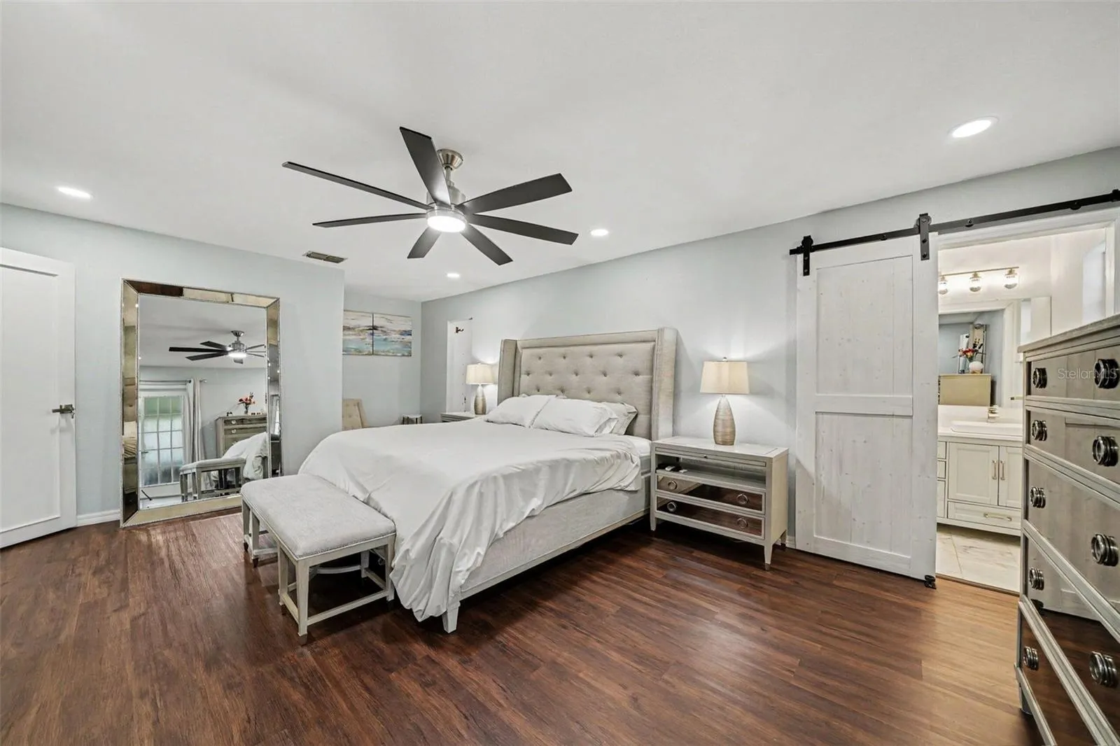 Primary Bedroom w/Barn Door to ensuite Bathroom