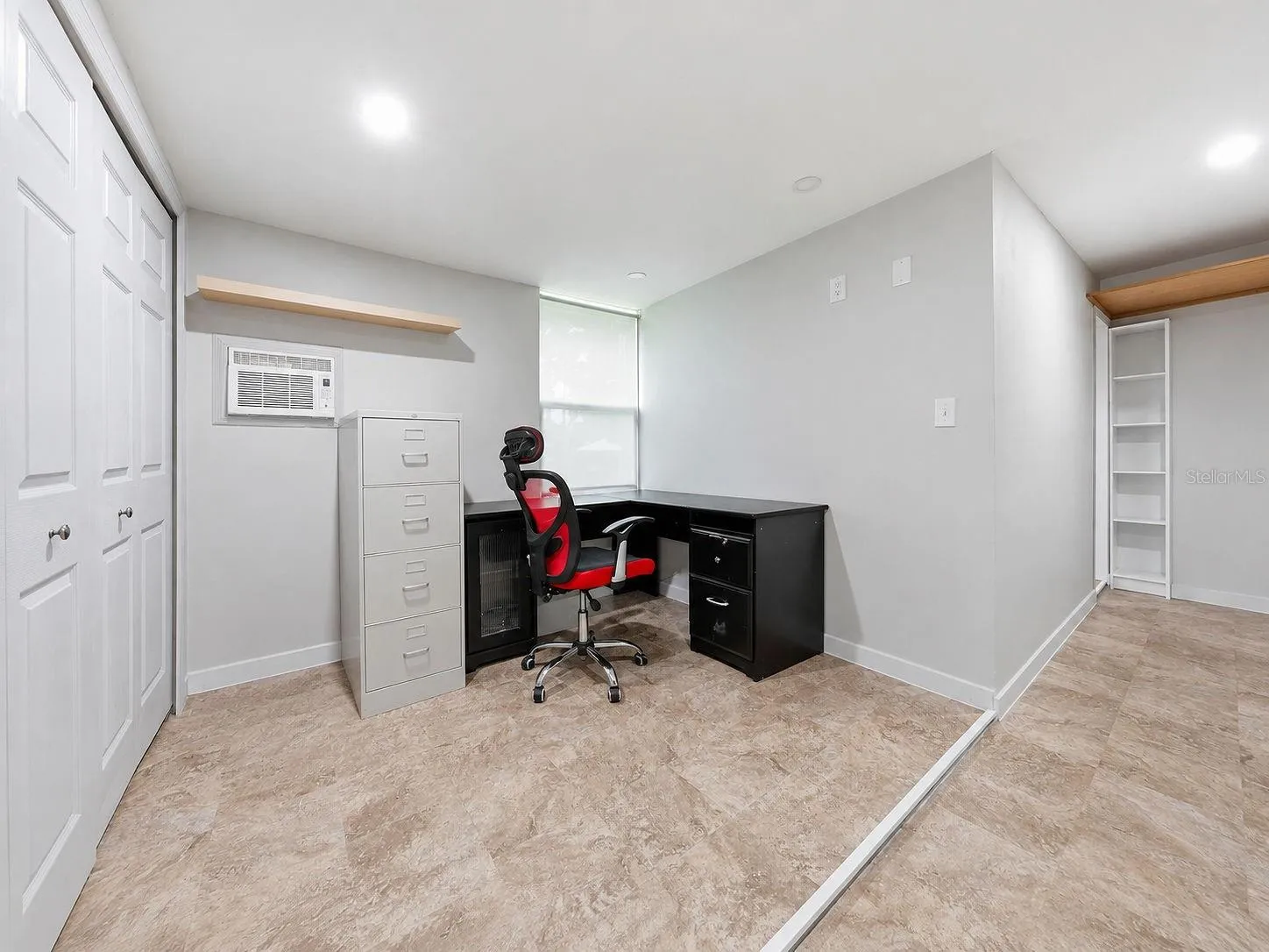 entry to 3rd room and laundry - this is just off the primary bdrm area