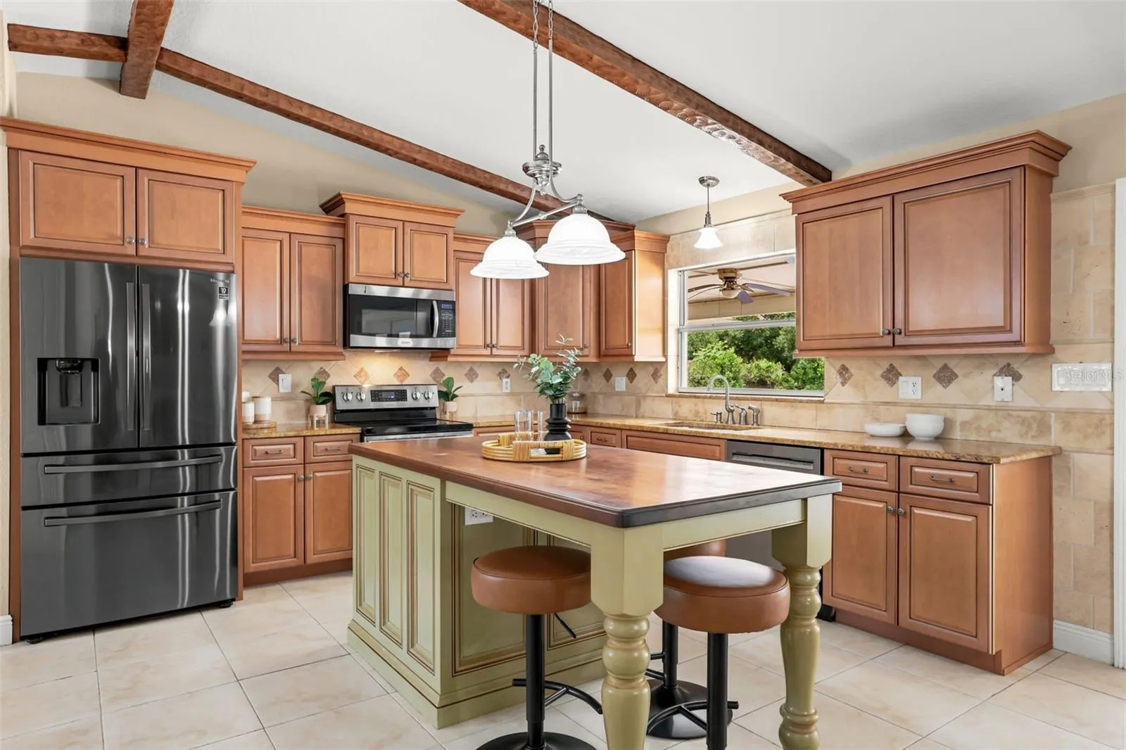 At the heart of the home, the STUNNING KITCHEN is designed for both everyday living and hosting with ease.