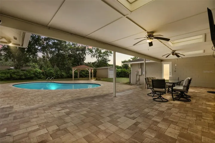 his BEAUTIFULLY UPDATED 4-bedroom, 3-bath pool home offers the perfect combination of space, style, and freedom with NO HOA.