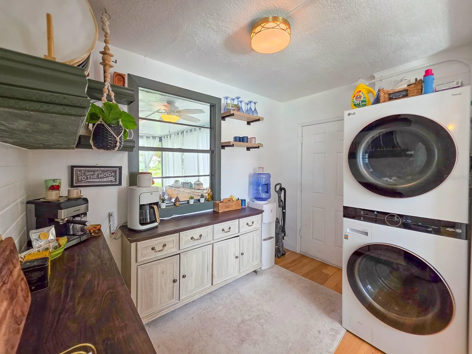 Butler's Pantry / Laundry  Floating Shelves and so much storage!