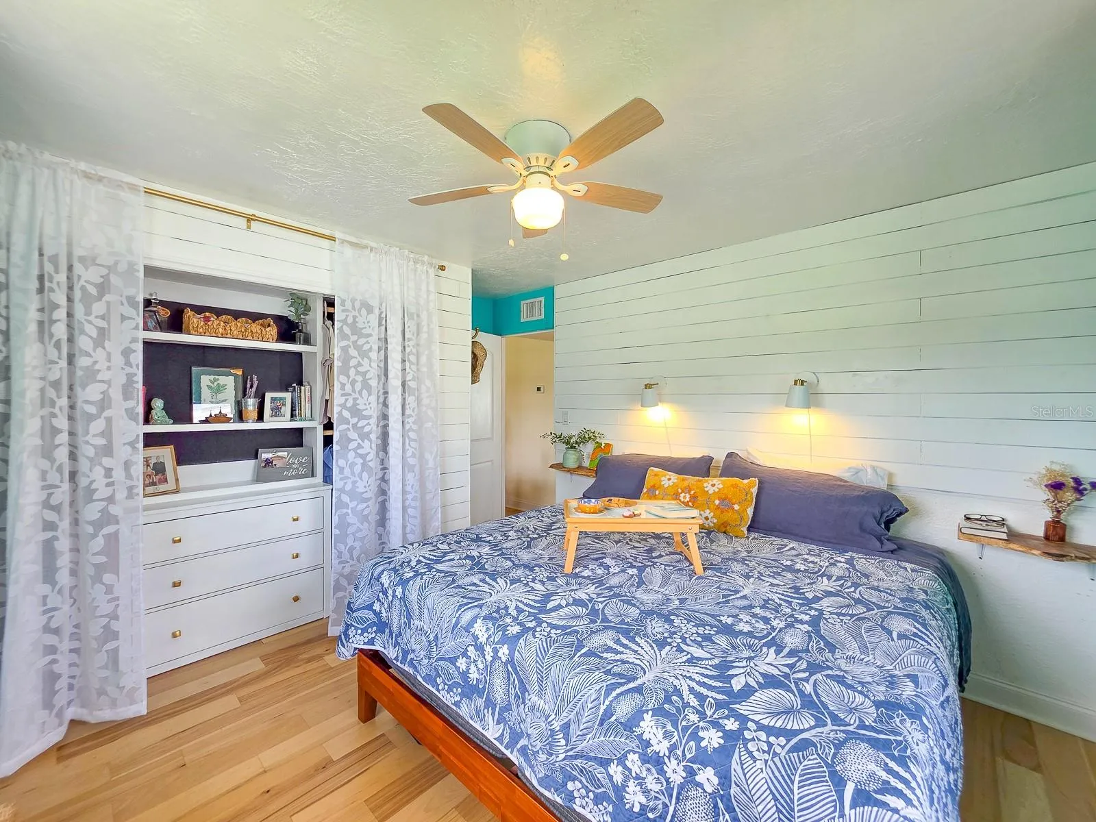 Built-in closet storage with hanging closets on either side.